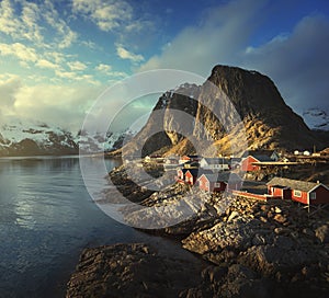 Fishing hut at spring sunset - Reine, Lofoten islands, Norway