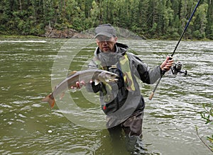 Fishing, Irkut river, Sayan mountains, Siberia, Russia, Siberian landscapes