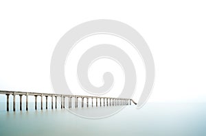 Fishing Jetty on Long Exposure and white sky, negative space