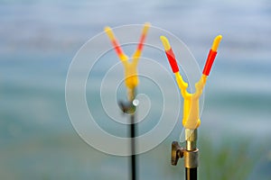Fishing on the lake. Stand for fishing rod, spinning close-up