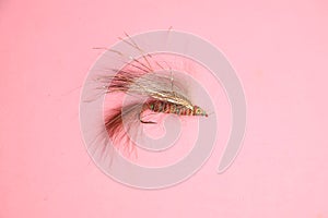 Fishing lure isolated on pink background