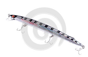 Fishing lure, wobbler, with three double hooks on an isolated white