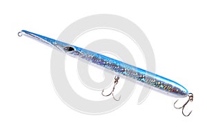 Fishing lure, wobbler, with two double hooks on an isolated white