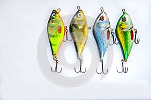 Fishing lures on White photo