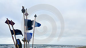 Fishing marker flags on the beach