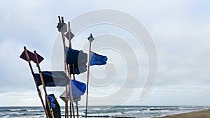 Fishing marker flags on the beach