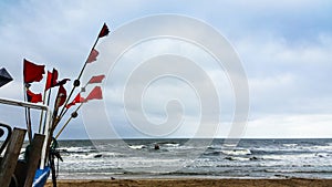 Fishing marker flags on the beach