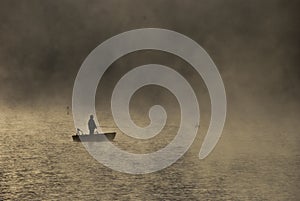 Fishing in the morning mist