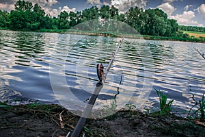 Fishing in the morning on the pond. Vacation, outdoor recreation.