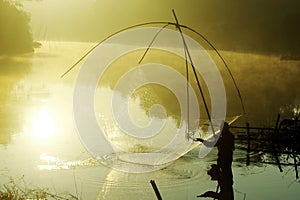 fishing in morning photo