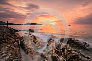 Fishing with motion wave at sunset, Phuket