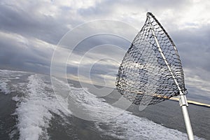 Fishing Net On Back Of Speeding Boat