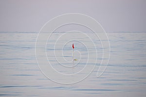 Fishing net buoy in the middle of mediterranean sea