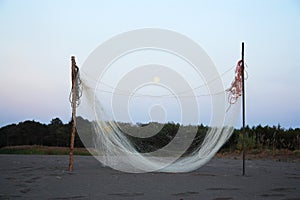 Fishing net dries late July evening