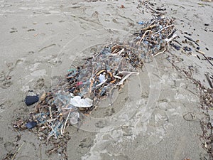 Fishing net full of plastic waste. Symbol fo ocean pollution