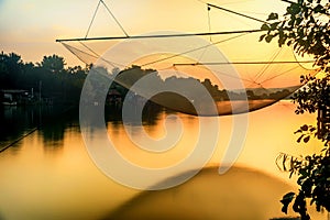 Fishing net on the river Bojana in Montenegro in the sunset