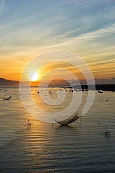 Fishing net in sunrise at Hoian, Danang