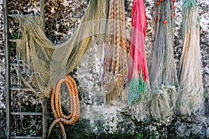Fishing nets hanging on wall background fishnet