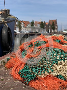 Fishing nets next to a boat in Harlingen