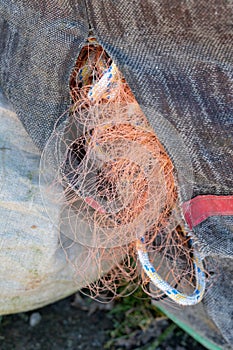 Fishing nets in a sack. A network for fishing on the fishing quay