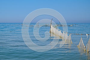 Fishing nets set in the sea. Fishing nets