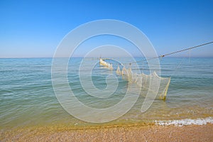 Fishing nets set in the sea. Fishing nets