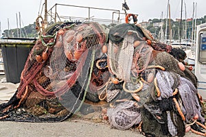 Fishing nets stacked on the pier