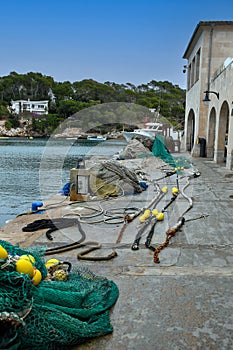 Fishing nets and tackle in port of Cala Figuera