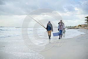 Fishing - One of lifes great joys. a two friends going fishing on an early overcast morning.