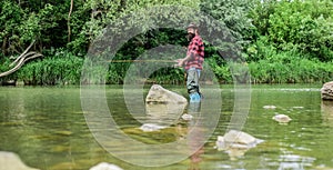 Fishing outdoor sport. Fisherman catching fish. Fishing hobby. Calm and tranquil. Patience and waiting. Fly fishing may