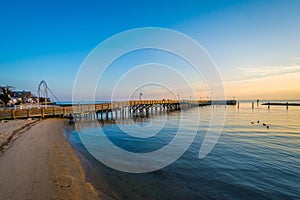 Fishing pier and the Chesapeake Bay at sunrise, in North Beach,