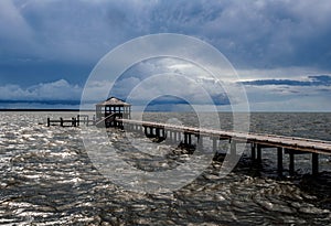 Fishing pier and dock as storm clouds roll in