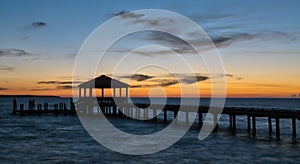 Fishing pier and dock at sunset