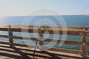 Fishing pole on the pier