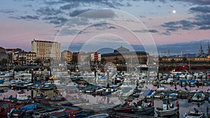 Fishing Port of Ferrol by Night with Full Moon Blue and magenta Sky La CoruÃÂ±a Galicia