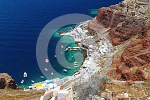 Fishing port in Thera Thira, Fira Santorini island, Cyclades, Southern Greece. Beautiful scenery, black volcanic rocks, traditio