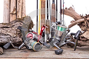 Fishing reels and rods with boards and snag