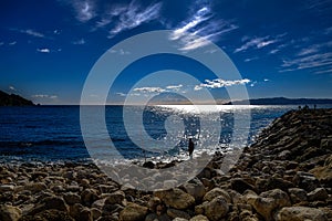 A Lonely Fisherman in the Mediterranean photo