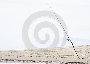 Fishing Rod On A Beach 