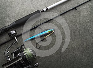 Fishing tackle background with fishing rod photo
