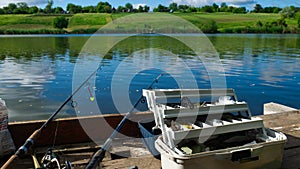 Fishing with a rod on the lake. Fishing tackle. Fishing from the shore for crucian.