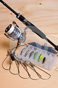 Fishing rod and reel with box for baits.