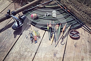 Fishing rod, reel, floats and tackle background