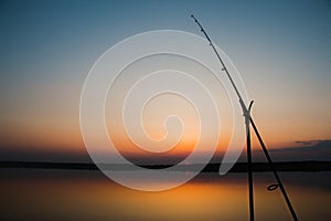 Fishing rod at sunset close-up