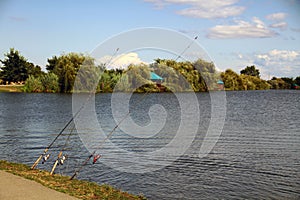 Fishing rods with bells cast into the lake