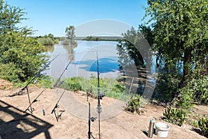 Fishing rods at Samevloeiing where Orange and Vaal Rivers join