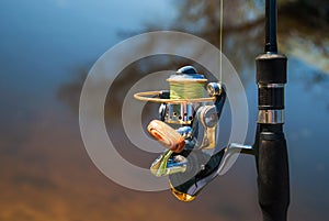 Fishing rods with spinning and reel of a fisherman