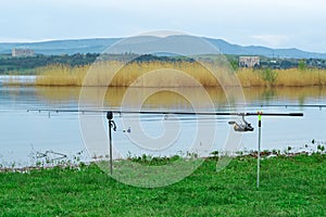 Fishing rods waiting for the byte on a lake