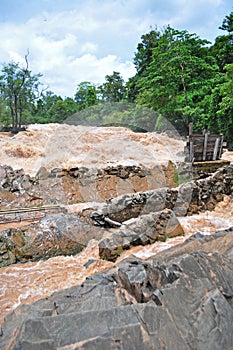 Fishing set at the Khone Phapheng falls on the Mekong River in Laos during the Monsoon flooding