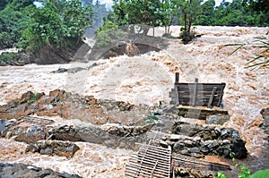 Fishing set at the Khone Phapheng falls on the Mekong River in Laos during the Monsoon flooding